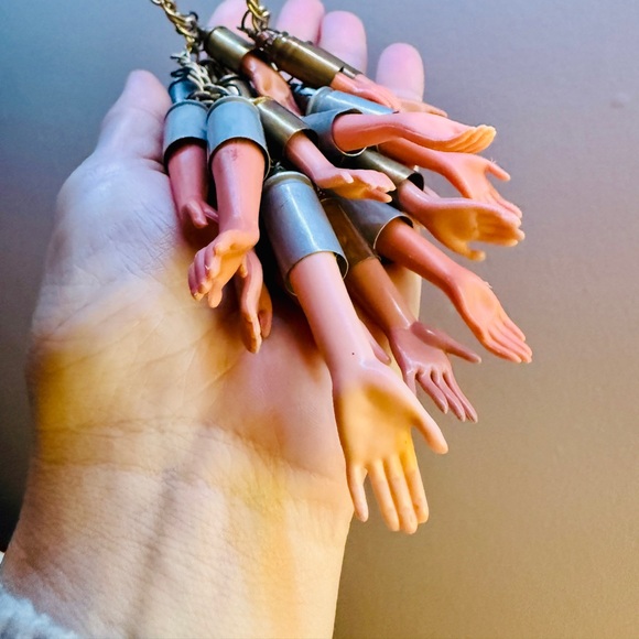Quirky Barbie Hand and Bullet Shell Casing One of a Kind Charm Necklace - Picture 7 of 12